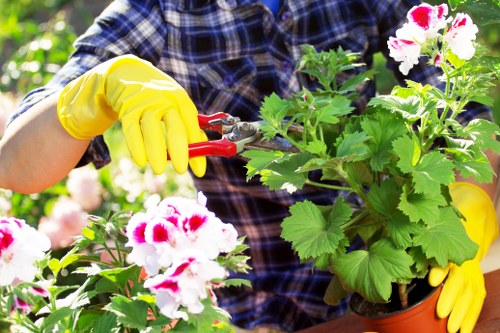 Garden maintenance team applying safety checks before work begins